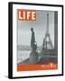 Paris, Statues with Eiffel Tower, March 18, 1946-Ed Clark-Framed Photographic Print