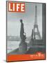 Paris, Statues with Eiffel Tower, March 18, 1946-Ed Clark-Mounted Photographic Print