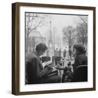 Parisian Couple Drinking Coca Cola at a Sidewalk Cafe While Reading, Paris, France, 1950-Mark Kauffman-Framed Photographic Print