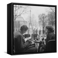 Parisian Couple Drinking Coca Cola at a Sidewalk Cafe While Reading, Paris, France, 1950-Mark Kauffman-Framed Stretched Canvas