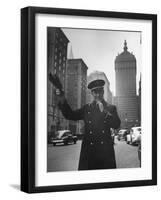 Park Avenue Doorman Using Whistle to Flag Down a Taxi For One of the Residents of His Building-William C^ Shrout-Framed Photographic Print