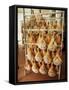 Parma Hams on Curing Racks, Near Pavullo, Emilia-Romagna, Italy-Ian Griffiths-Framed Stretched Canvas