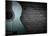Part of a Blue Acoustic Guitar on a Gray Wooden Background-Boiko Y-Mounted Photographic Print