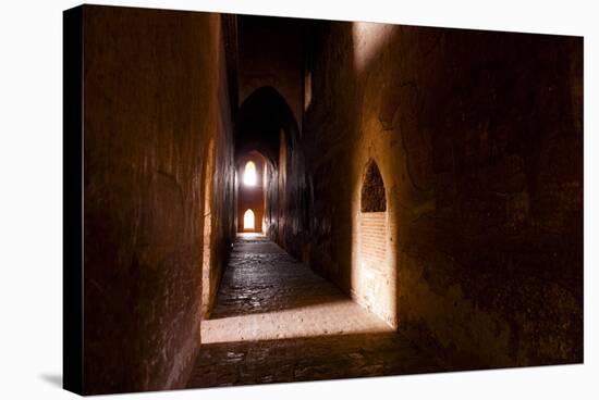 Passage in Buddhist Temple with Incidental Ray of Light in Bagan, Myanmar-Harry Marx-Stretched Canvas