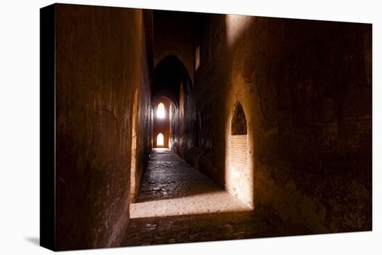 Passage in Buddhist Temple with Incidental Ray of Light in Bagan, Myanmar-Harry Marx-Stretched Canvas