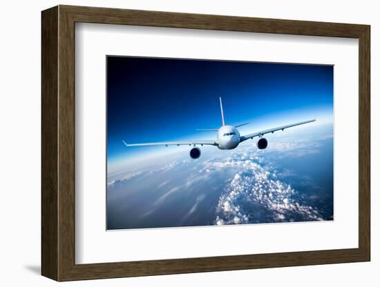 Passenger Airliner Flying in the Clouds-Andrey Armyagov-Framed Photographic Print