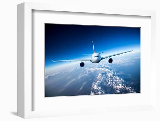 Passenger Airliner Flying in the Clouds-Andrey Armyagov-Framed Photographic Print