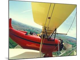 Passenger and Pilot in Biplane over Tulip Fields, Skagit Valley, Washington, USA-Stuart Westmoreland-Mounted Photographic Print