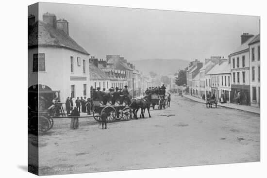 Passenger Carts in the Main Street of Kenmare, Ireland, 1890s-Robert French-Stretched Canvas