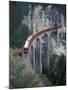 Passenger Train on Rock Bridge, Switzerland-Gavriel Jecan-Mounted Photographic Print