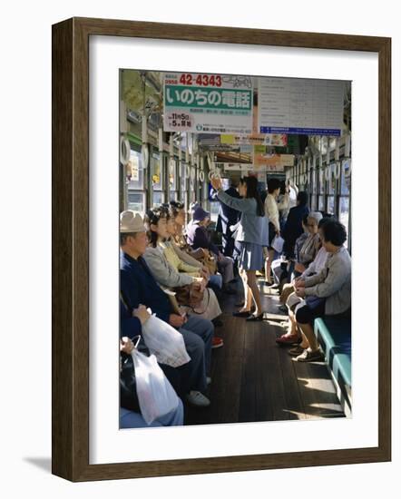 Passengers, Interior a Public Tram, Nagasaki, Island of Kyushu, Japan-Christopher Rennie-Framed Photographic Print