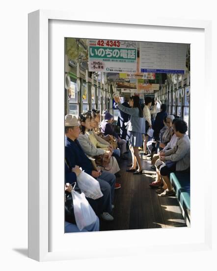 Passengers, Interior a Public Tram, Nagasaki, Island of Kyushu, Japan-Christopher Rennie-Framed Photographic Print