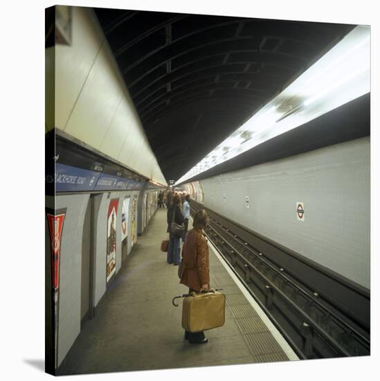 Passengers Waiting at Blackhorse Tube Station on the Victoria Line, London, 1974-Michael Walters-Stretched Canvas