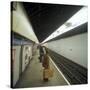 Passengers Waiting at Blackhorse Tube Station on the Victoria Line, London, 1974-Michael Walters-Stretched Canvas