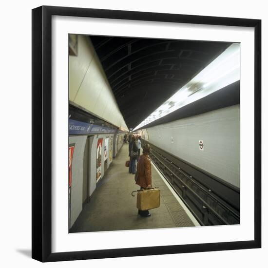 Passengers Waiting at Blackhorse Tube Station on the Victoria Line, London, 1974-Michael Walters-Framed Photographic Print