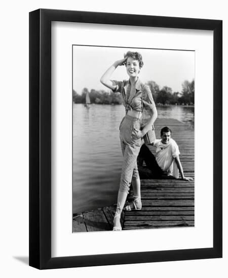 Pat Goddard in Malcom Brown Gingham Blouse and Jeans with Roger Moore, 1952-John French-Framed Giclee Print