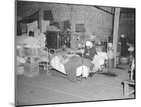 Patient in a Red Cross temporary infirmary for flood refugees at Forrest City, Arkansas, 1937-Walker Evans-Mounted Photographic Print