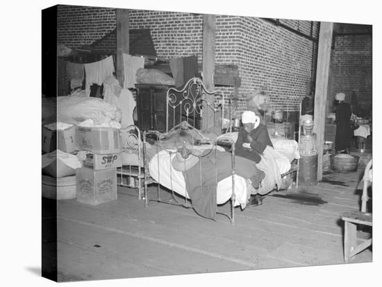 Patient in a Red Cross temporary infirmary for flood refugees at Forrest City, Arkansas, 1937-Walker Evans-Stretched Canvas