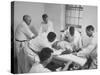 Patient, Surrounded by Men in White, Receiving Electric Shock Treatment-null-Stretched Canvas