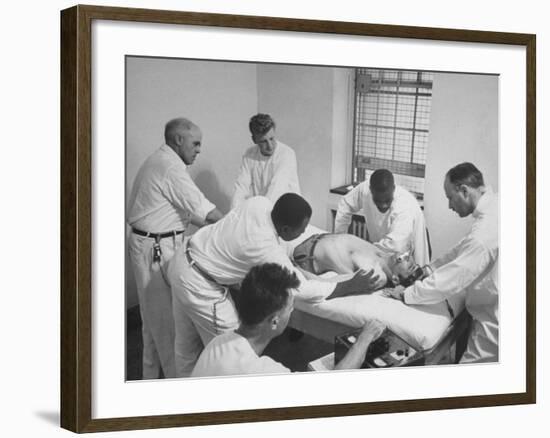 Patient, Surrounded by Men in White, Receiving Electric Shock Treatment-null-Framed Photographic Print