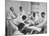 Patient, Surrounded by Men in White, Receiving Electric Shock Treatment-null-Mounted Photographic Print
