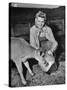 Patricia Colleen Altree Teaching a Calf How to Drink Milk from a Pail-null-Stretched Canvas