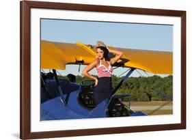 Patriotic Pin-Up Girl Standing Inside the Cockpit of a Stearman Biplane-null-Framed Photographic Print