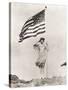 Patriotic Woman Holding American Flag and Saluting-null-Stretched Canvas