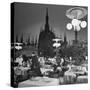 Patrons Drinking and Dining at an Outside Cafe with Cathedral in Background-Dmitri Kessel-Stretched Canvas