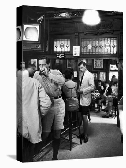 Patrons Inside P.J. Clarke's Saloon Include Men Wearing Bermuda Shorts, a New Fad-Alfred Eisenstaedt-Stretched Canvas