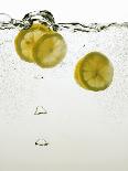 Lemon Slices in Water-Paul Blundell-Laminated Photographic Print