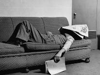 Writer Niven Busch Lying on Sofa with Newspaper over His Face as He Takes Nap from Screenwriting-Paul Dorsey-Photographic Print