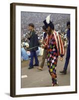 Paul Foster Walking During the Woodstock Music and Art Festival-Bill Eppridge-Framed Premium Photographic Print