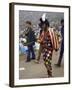 Paul Foster Walking During the Woodstock Music and Art Festival-Bill Eppridge-Framed Premium Photographic Print