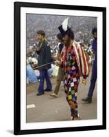 Paul Foster Walking During the Woodstock Music and Art Festival-Bill Eppridge-Framed Photographic Print