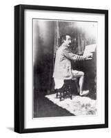 Paul Gauguin (1848-1903) Playing the Harmonium in Mucha's Studio, c.1895-Alphonse Mucha-Framed Photographic Print