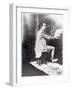 Paul Gauguin (1848-1903) Playing the Harmonium in Mucha's Studio, c.1895-Alphonse Mucha-Framed Photographic Print