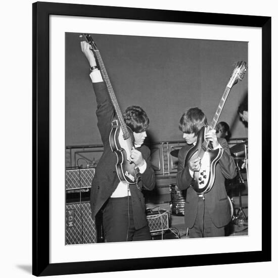 Paul Mccartney and George Harrison Tune their Guitars-Associated Newspapers-Framed Photo