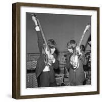 Paul Mccartney and George Harrison Tune their Guitars-Associated Newspapers-Framed Photo