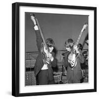Paul Mccartney and George Harrison Tune their Guitars-Associated Newspapers-Framed Photo