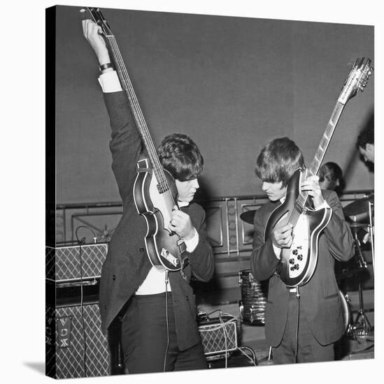 Paul Mccartney and George Harrison Tune their Guitars-Associated Newspapers-Stretched Canvas