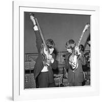 Paul Mccartney and George Harrison Tune their Guitars-Associated Newspapers-Framed Photo