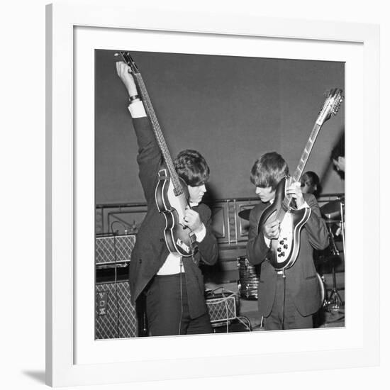 Paul Mccartney and George Harrison Tune their Guitars-Associated Newspapers-Framed Photo