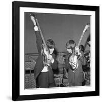 Paul Mccartney and George Harrison Tune their Guitars-Associated Newspapers-Framed Photo