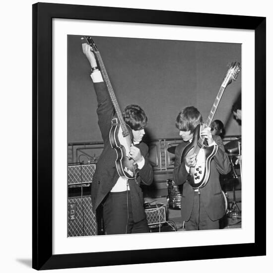 Paul Mccartney and George Harrison Tune their Guitars-Associated Newspapers-Framed Photo