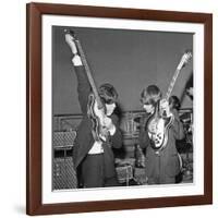 Paul Mccartney and George Harrison Tune their Guitars-Associated Newspapers-Framed Photo