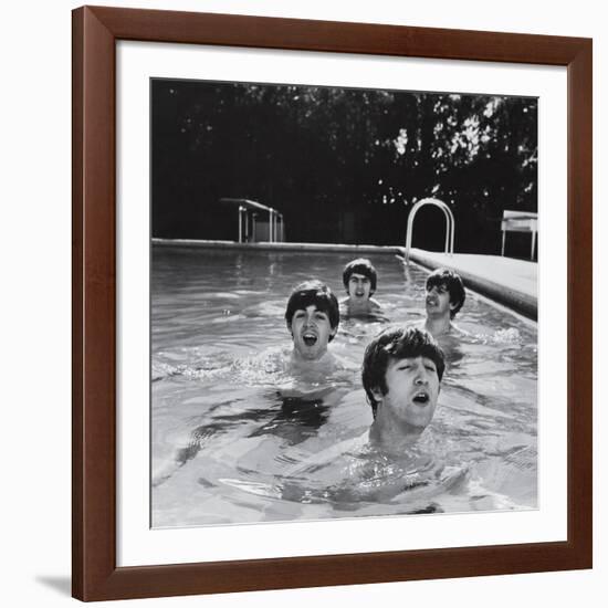 Paul McCartney, George Harrison, John Lennon and Ringo Starr Taking a Dip in a Swimming Pool-John Loengard-Framed Premium Photographic Print