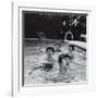 Paul McCartney, George Harrison, John Lennon and Ringo Starr Taking a Dip in a Swimming Pool-null-Framed Premium Photographic Print