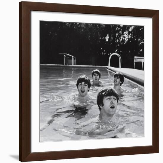 Paul McCartney, George Harrison, John Lennon and Ringo Starr Taking a Dip in a Swimming Pool-null-Framed Premium Photographic Print