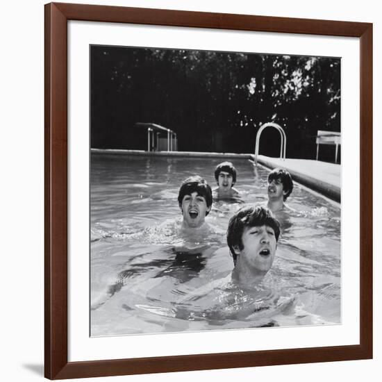 Paul McCartney, George Harrison, John Lennon and Ringo Starr Taking a Dip in a Swimming Pool-null-Framed Photographic Print